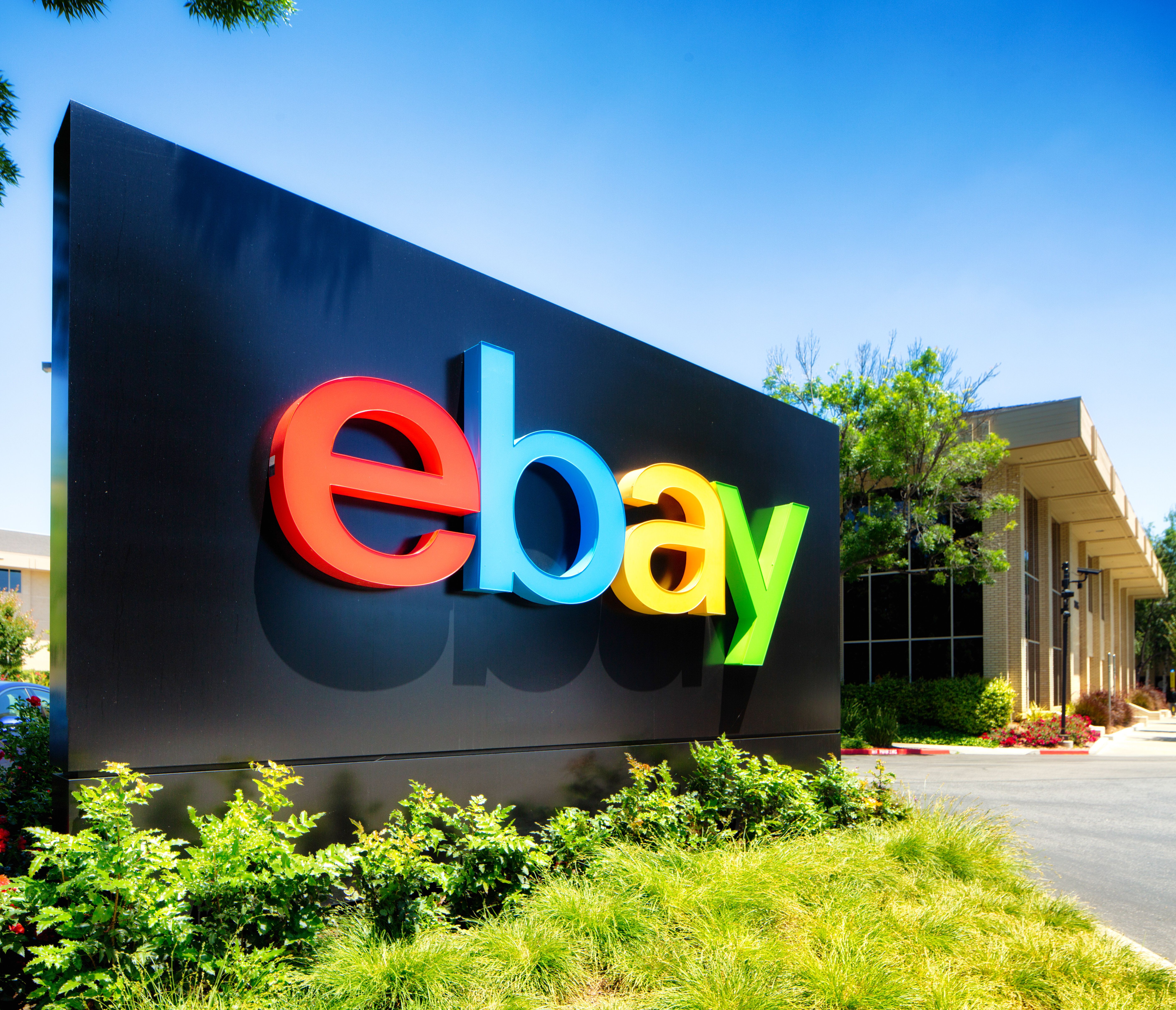 San Jose, USA - May 9, 2016: Ebay south campus entrance sign in San Jose California. Oblique view with campus building behind
