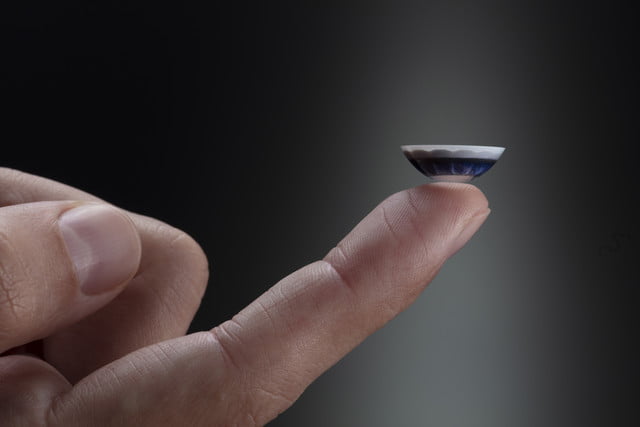 augmented reality contact lenses vision mojo lens on finger